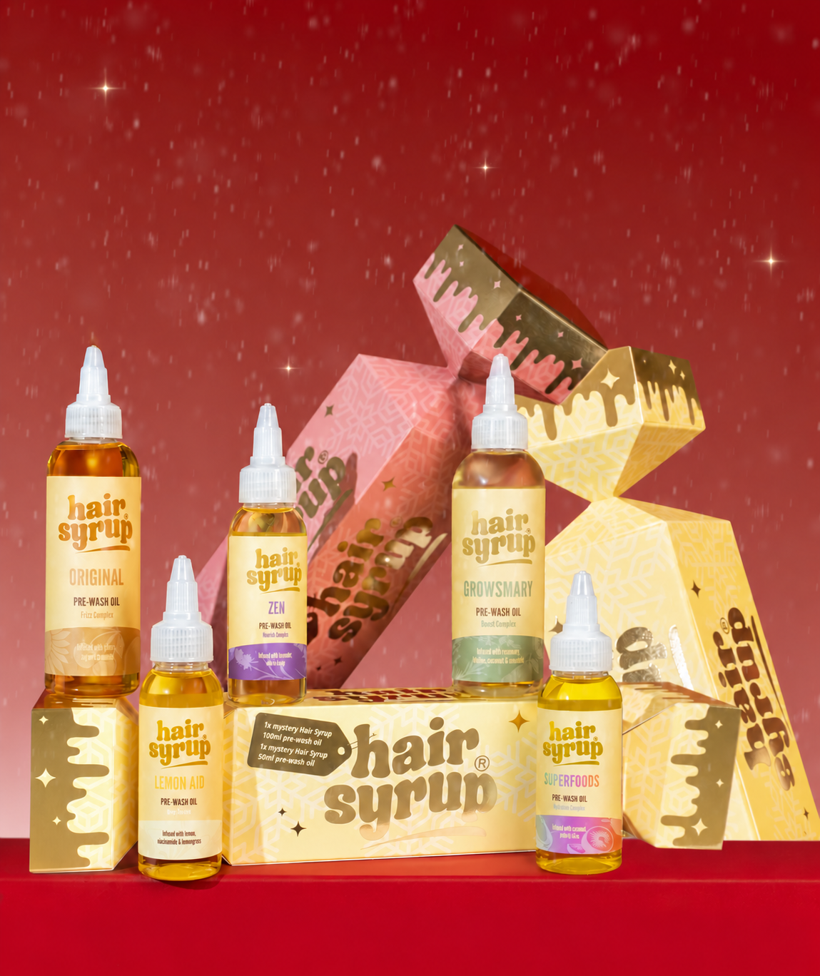 Hair Syrup Mystery Christmas Crackers in yellow and pink